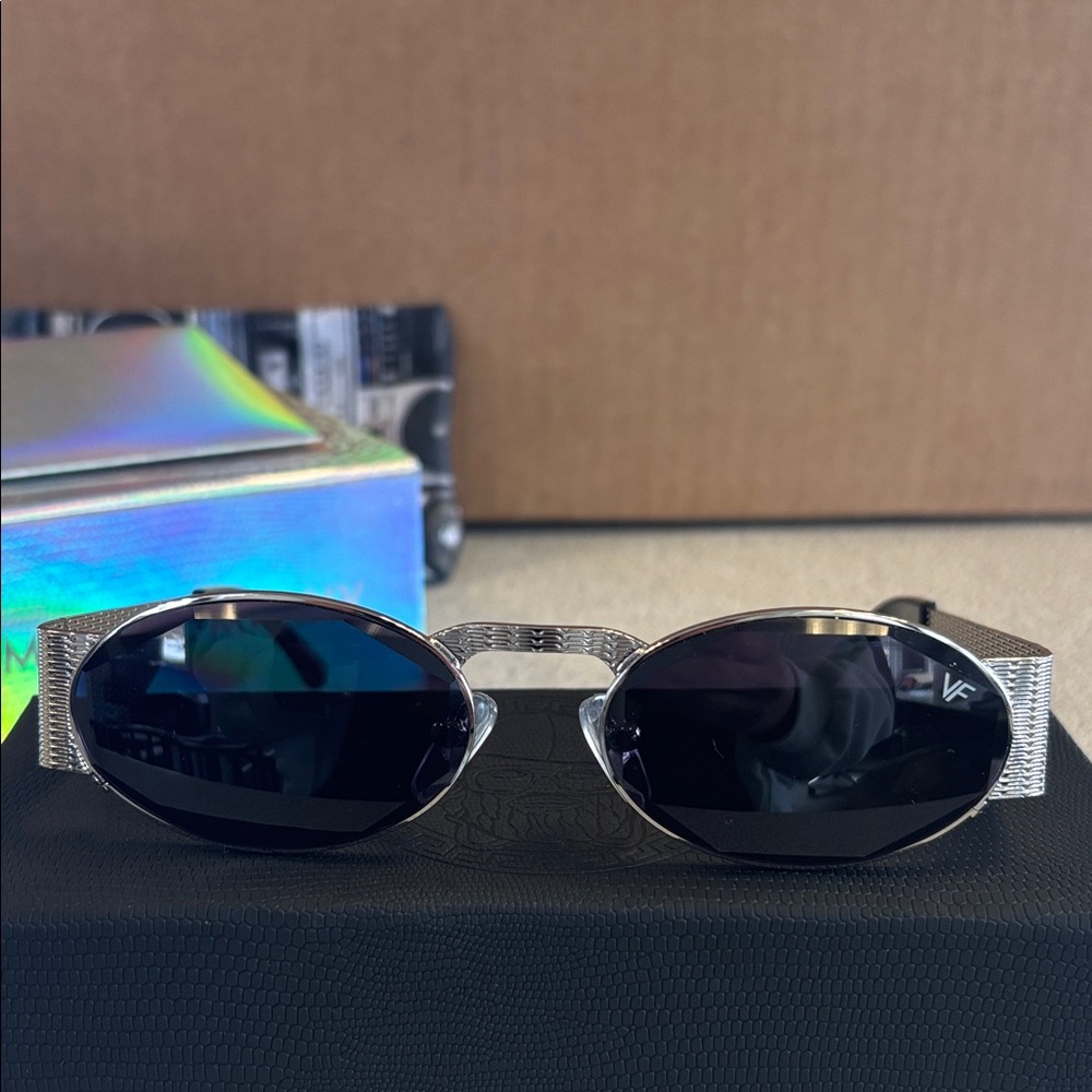 Sleek Silver Sunglasses with Black Lenses